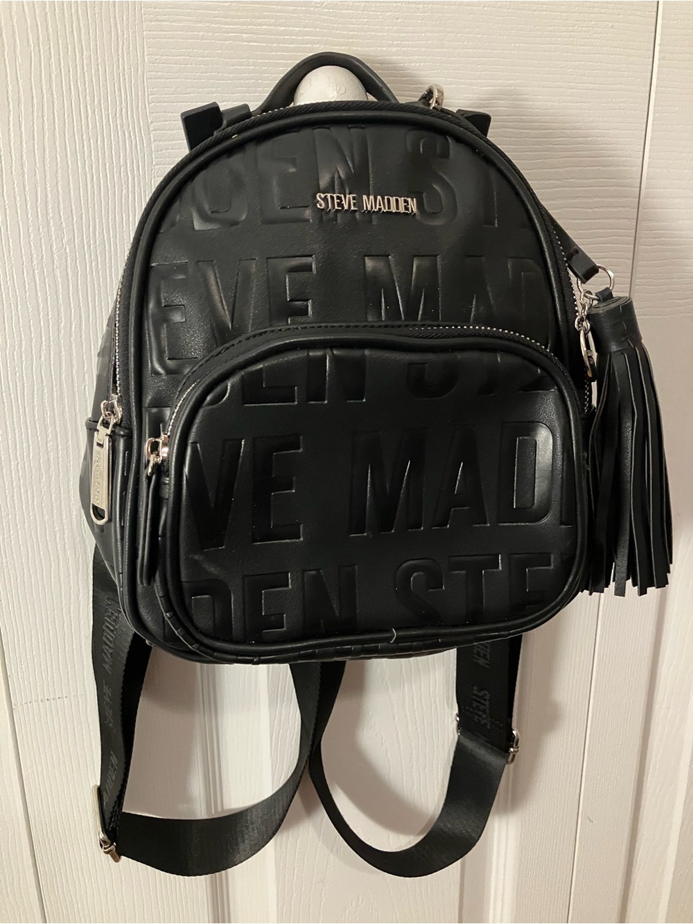 Steve Madden Black Embossed Logo Mini Backpack with Tassel